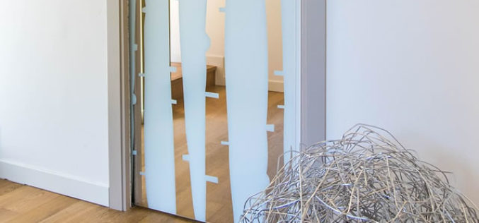 Advantages Of Elegant Glass Sliding Wardrobe Doors