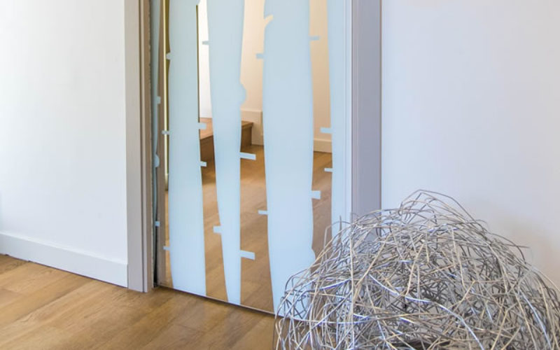 Advantages Of Elegant Glass Sliding Wardrobe Doors