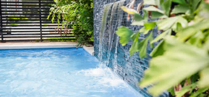 How to Install Custom Water Features in Your Backyard Pool Makeover