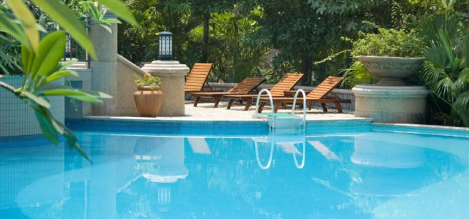 Deluxe Swimming Pool Connected to Patio