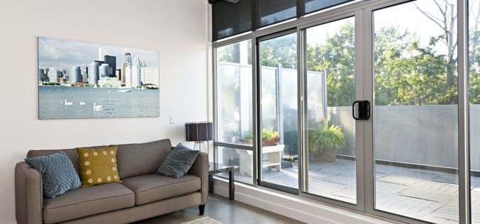 Living Room With Sliding Glass Door to Balcony