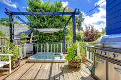 Walkout Deck With Jacuzzi Under a Make-Shift Pergola