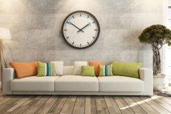 Modern Sofa Underneath Big Wall Clock