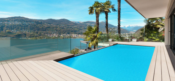 Modern Home with a Beautiful Patio Pool Overlooking a Bay