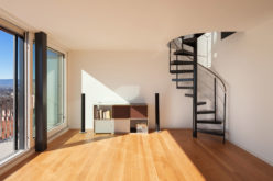 Interior View, Open Space of a Duplex with Spiral Staircase
