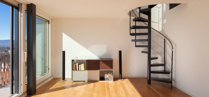 Interior View, Open Space of a Duplex with Spiral Staircase