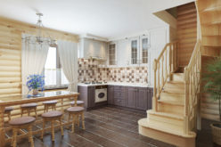 Log Interior Staircase From Upstairs to the Kitchen Area
