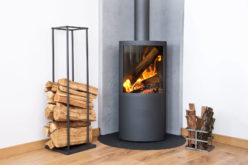 Modern Wood Burning Stove Tucked in Room Corner