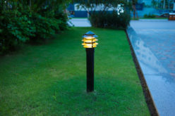 Solar Power Illuminated Outdoor Light at Twilight