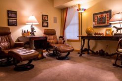 Enjoying a Home Video in Comfortable Home Theater Seating